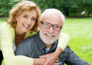 Closeup portrait of a happy older couple smiling  and showing affection